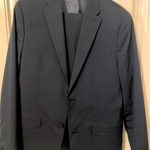 Perry Ellis slim navy suit. Jacket and pants. Excellent condition.